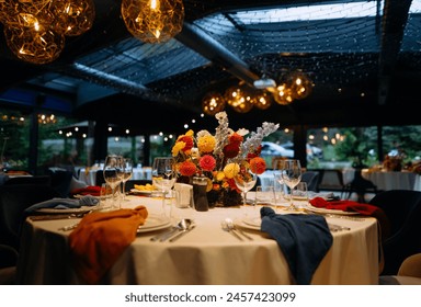 venue for a wedding reception with decor, selective focus on tables and decor - Powered by Shutterstock