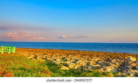 The Verging Sun Shine Over The Fringing Reef.