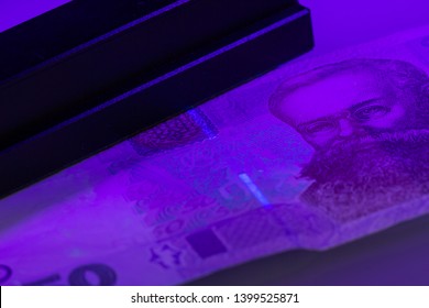 Verifying The Authenticity Of The Fifty Hryvnia Banknote In Ultraviolet Light. Ukrainian Money. Mykhailo Hrushevsky. Equipment For In-depth Inspection Of Money. Fake Money Or Financial Crisis Concept