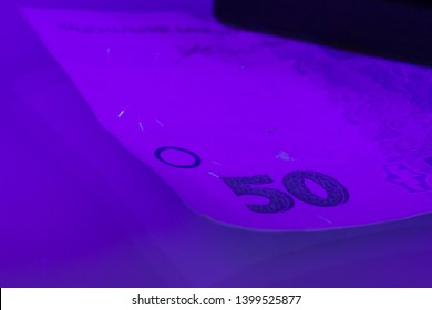 Verifying The Authenticity Of The Fifty Hryvnia Banknote In Ultraviolet Light. Ukrainian Money. Mykhailo Hrushevsky. Equipment For In-depth Inspection Of Money. Fake Money Or Financial Crisis Concept