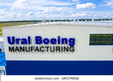 Verkhnyaya Salda, Russia - July 11, 2020: Signboard Of Ural Boeing Manufacturing On Building Of Plant For Production Of Titanium For Aircraft Construction