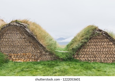 VERMAHLID, ICELAND - AUGUST 2018: Traditional Icelandic Turf Houses Houses With Grass On Roof In Glaumbaer Folk Heritage Museum.