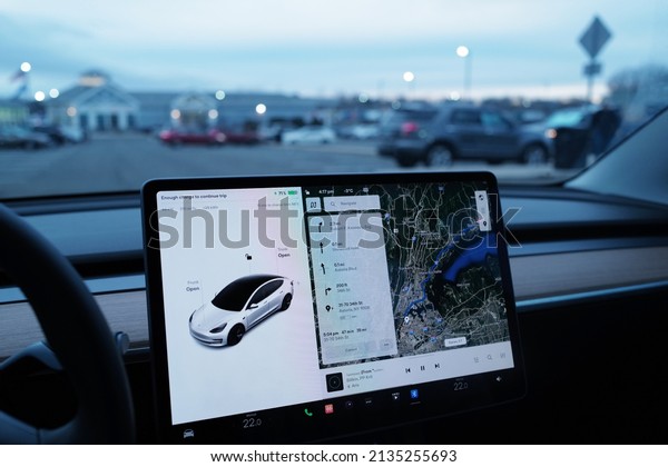 VERMONT, UNITED STATES- MARCH 9, 2022:\
Interior dashboard design and steering wheel decoration of \'TESLA\
MODEL 3\' electric-powered performance\
car