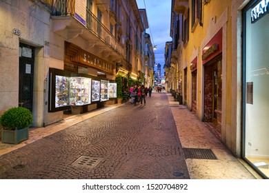 VERONA, ITALY - CIRCA MAY, 2019: a view of a street located in Verona in the evening.