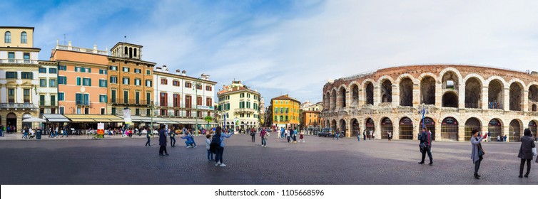 VERONA, ITALY - CIRCA OCT 2017: Panoramic view of central square and Arena Verona, Roman amphitheater. Tourists near Verona Arena Roman amphitheater in Verona, Italy, panorama.