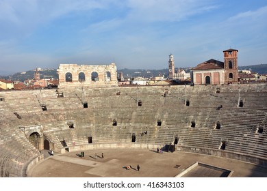 VERONA, ITALY - DECEMBER 15: Panoramic view of the famous Verona Arena, an ancient roman amphitheater still in use, with city skyline on December 15, 2015 in Verona