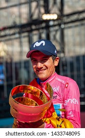 Verona, Italy June 2, 2019: Richard Carapaz, Movistar Team, In Pink Jersey Show Everyone The Infinite Trophy Having Won The General Classification Of The Giro D'Italia 2019.