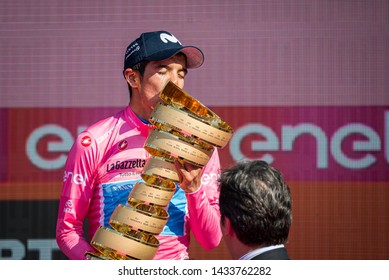 Verona, Italy June 2, 2019: Richard Carapaz, Movistar Team, In Pink Jersey Kiss The Infinite Trophy Having Won The General Classification Of The Giro D'Italia 2019.