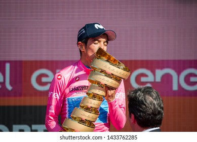 Verona, Italy June 2, 2019: Richard Carapaz, Movistar Team, In Pink Jersey Kiss The Infinite Trophy Having Won The General Classification Of The Giro D'Italia 2019.