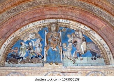 VERONA, ITALY - MAY 27, 2017: Virgin holding the Christ child, centered between, the Annunciation to the Shepherds and the Adoration of the Magi, Cathedral dedicated to the Virgin Mary in Verona.