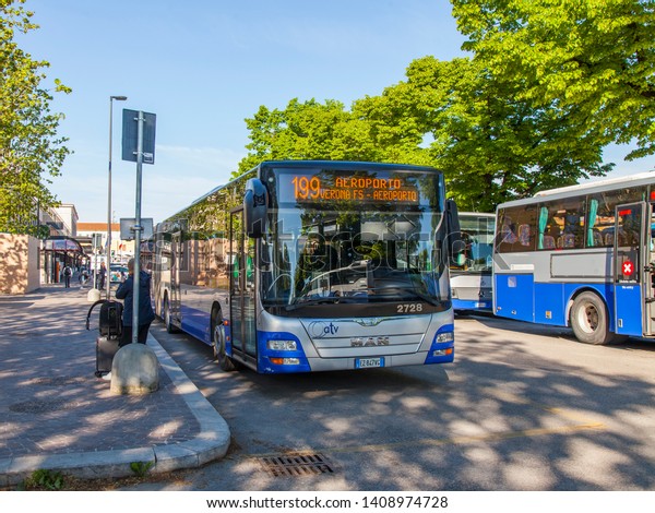 Verona, Italy, on April 27,\
2019. City bus station. The shuttle to the airport waits for\
passengers