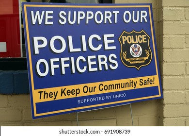 VERONA, NEW JERSEY - AUGUST 3, 2017: Sign along Bloomfield Avenue in Verona that says, WE SUPPORT OUR POLICE OFFICERS. Editorial use only.   