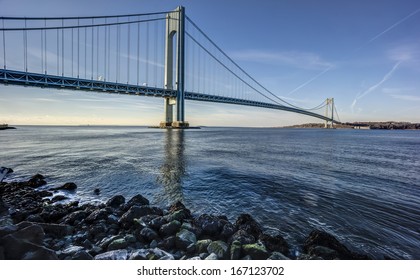 Verrazano Narrows Bridge, in the U.S. state of New York, is a double-decked suspension bridge that connects the boroughs of Staten Island and Brooklyn in New York City at the Narrows