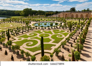 Versailles, France - August 20 2017: Orangery garden in the park of Versailles, with orange trees in boxes.