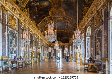 Versailles, France - August 28, 2019 : People visiting the hall of Mirrors in the palace of Versailles