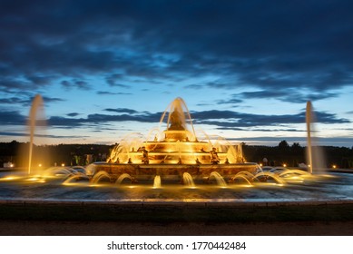 VERSAILLES, FRANCE - JUNE 27: Latona fountain at twilight on June 27, 2020 in the gardens of Versailles palace near Paris France