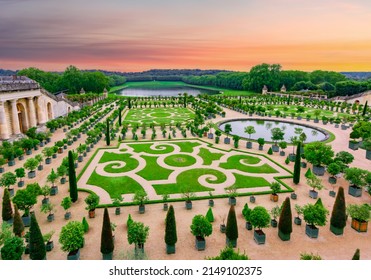 Versailles, France - May 2019: Versailles formal gardens (Orangery) outside Paris at sunset