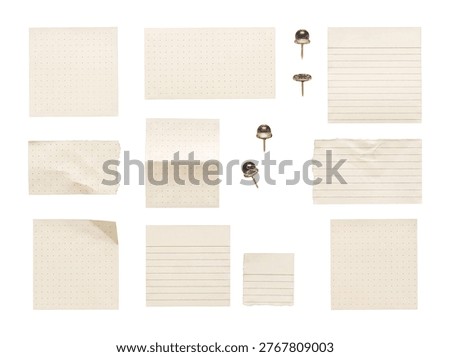 A versatile collection of various blank dot grid and lined paper notes, accompanied by shiny metallic pushpins.