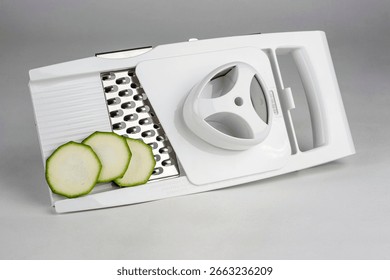 A versatile kitchen slicer designed for precise food preparation, perfect for slicing vegetables and creating healthy meals.