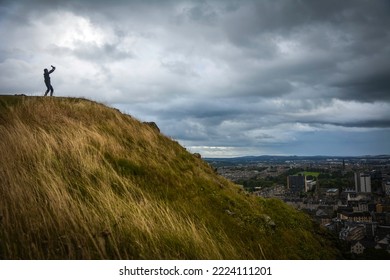Version of The Lion King with a Camera at the Topo of Arthur's Seat, Edinburgh