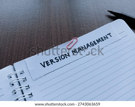 Version management writting on table background. 