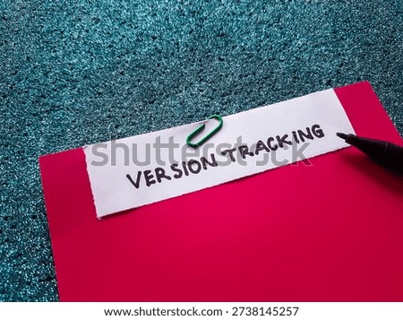 Version tracking writting on blue background. 