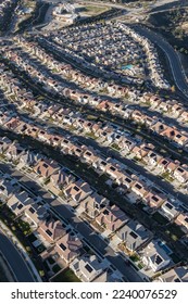 Vertical aerial view of new suburban Santa Clarita neighborhoods in Los Angeles County, California. - Shutterstock ID 2240076529