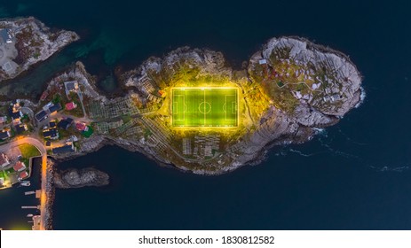 Vertical aerial view of a special football field placed on a half island in Lofoten, Norway