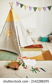 Vertical Background Image Of Cute Kids Room Interior With Play Tent And Decor In Pastel Colors