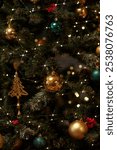 Vertical background image of glittering Christmas tree decorated with golden baulbs copy space