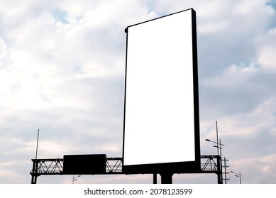 vertical billboard against the background of the cloudy sky. mockup, place for your information or advestering - Shutterstock ID 2078123599