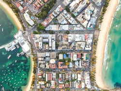 Vertical Bird's Eye Aerial Drone Panoramic View Of The Oceanside Suburb Of Manly, Sydney, New South Wales, Australia. Harbourside On The Left, Oceanside With Famous Manly Beach On The Right Side.