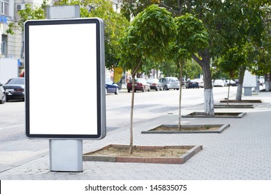 Vertical Blank Billboard On The City Street