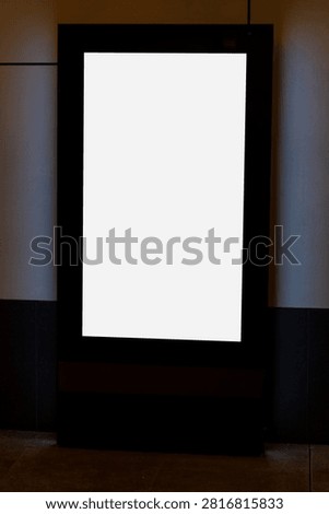 A vertical blank poster mockup. A customizable space for showcasing commercial advertisements, digital signage, artwork, or promotional displays.