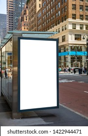 Vertical Blank White Billboard Mockup For Advertising, Bus Stop At New York City Buildings And Street Background