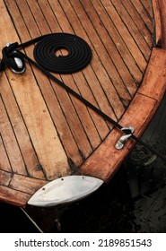 A Vertical Closeup Of Wooden Boat Deck With Mooring Warps