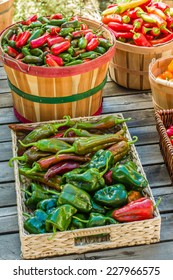 Vertical composition of peppers in baskets