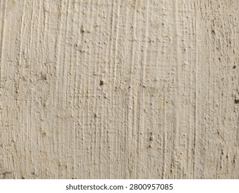 Vertical Concrete Texture Background with Rough Beige Cement Surface and Linear Pattern