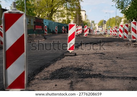 Vertical delineators protecting a work zone at an urban infrastructure site