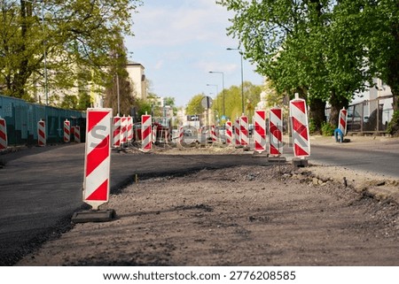 Vertical delineators used for traffic control during urban paving