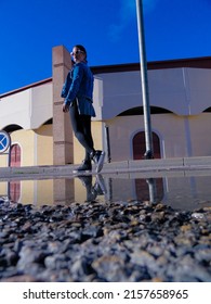 A Vertical Elegant Picture Of A Young Spanish Female In An Urban Fashion Shoot