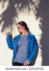 A Vertical Elegant Shot Of A Young Spanish Female In An Urban Fashion Shoot