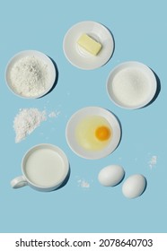 Vertical Flatlay With Baking Ingredients On Blue Backdrop