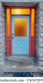 Vertical Frame Frosted Glass Panes On The Front Door Sidelights And Transom Window Of Home