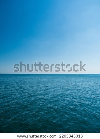 Vertical front view landscape Blue sea and sky blue background morning day look calm summer Nature tropical sea Beautiful  ocen water travel 