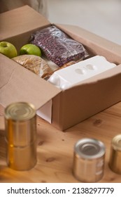 Vertical High Angle No People Shot Of Cardboard Box Full Of Various Food Supplies Prepared For Donation