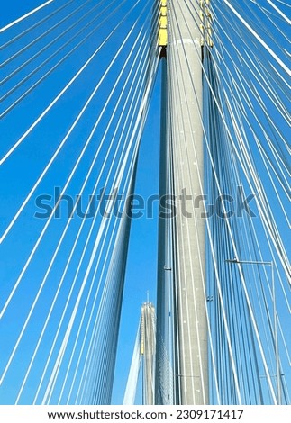 The vertical Hong Kong highway bridge building with clean blue sky at daytime