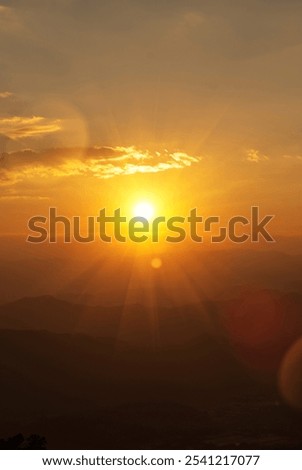 Vertical Horizon Sunset mountain range beautiful landscape mist foggy sunrise beam. Golden sky Mountain landscape mountain. Vertical Amazing Landscape cloud sky on sunrise. Gold sunlight heaven scene
