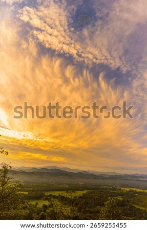 Vertical Horizon Sunset mountain range beautiful landscape mist foggy sunrise beam. Golden sky Mountain landscape mountain. Vertical Amazing Landscape cloud sky on sunrise. Gold sunlight heaven scene