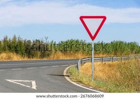 Vertical and Horizontal Yield Sign at an Intersection.